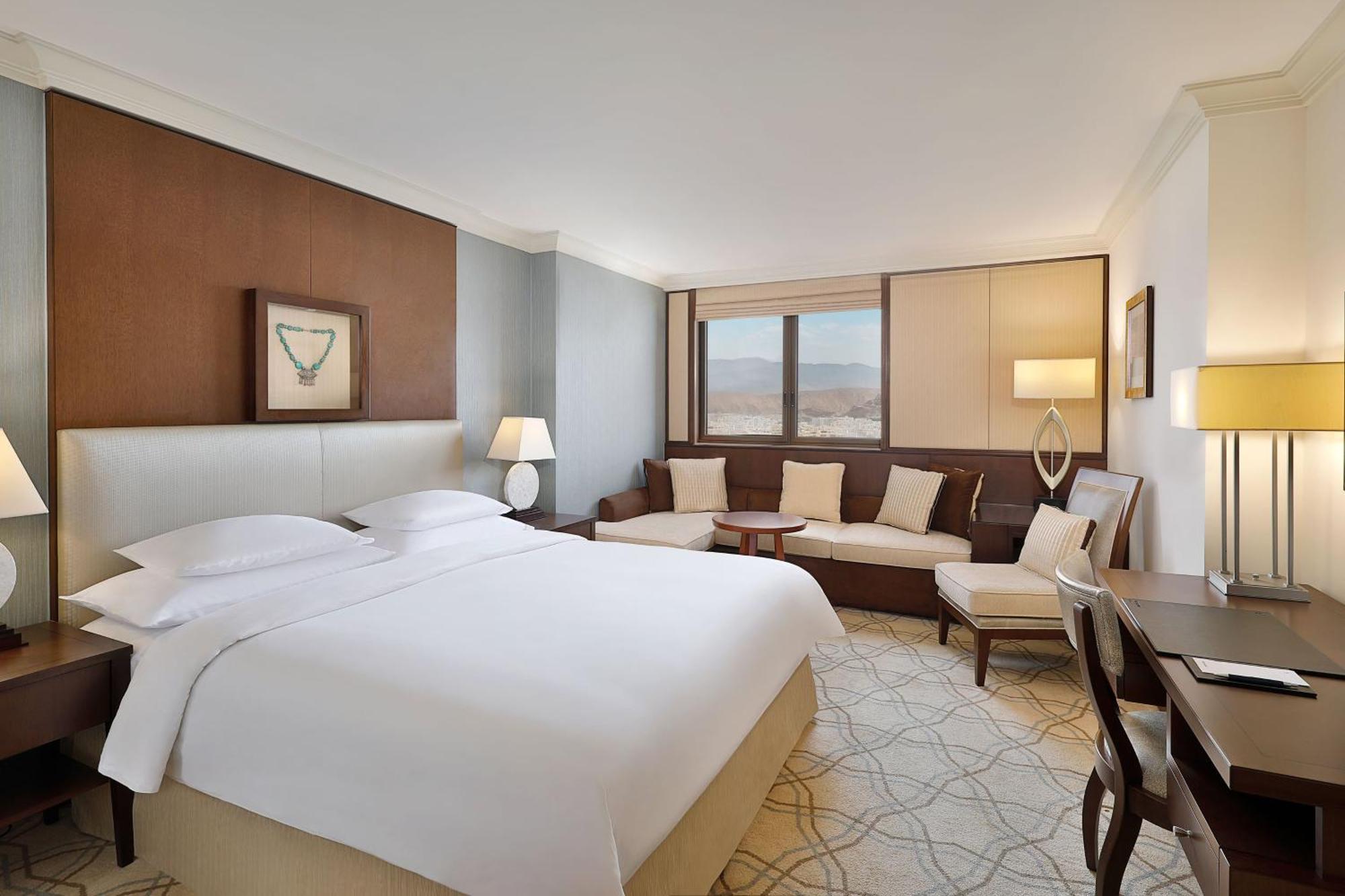 Sheraton Oman Hotel Маскат Екстер'єр фото A guest room at the hotel